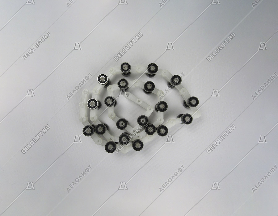 Цепи огибающие балюстрады эскалатора