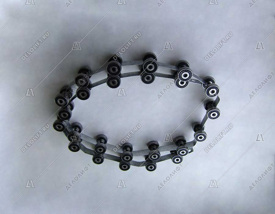 Цепи огибающие балюстрады эскалатора